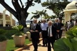 In advance of the inaugural ceremony, Mawlana Hazar Imam, accompanied by Prince Hussain and Princess Khaliya, tours Forodhani Park with Luis Monreal, General Manager of the Aga Khan Trust for Culture.