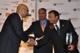 Ali Velshi and SACC President Mustafa Tameez present the 2009 Outstanding Community Organization Award to FOCUS Board Member Nasir Panjwani.
