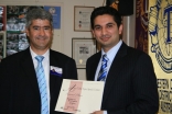 Hussain Rajwani (right) of Sydney, Australia was awarded second prize in a Toastmasters divisional competition.