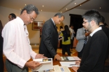 ATHAR participants browse a selection of Aga Khan Trust for Culture publications at the Ismaili Centre, Dubai.