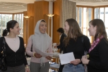 Women of diverse backgrounds exchange stories and ideas at the International Women’s Day event held at the Ismaili Centre, London.