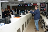 Michael Kahlenberg leads FOCUS Regional Disaster Managers on a tour of the Emergency Operations Center at the Harris County Office of Homeland Security and Emergency Management in Houston.