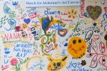 The Ismaili Council’s Art for Alzheimerâ€™s canvas includes notes from many supporters, including the First Lady of California, Maria Shriver.