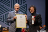 Prince Amyn presents the 2022 Aga Khan Music Award for Lifetime Achievement to Zakir Hussain.