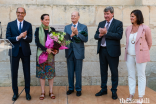 Princess Zahra joins Prince Amyn, Isabelle Wojtowiez, Xavier Darcos, and Eric Woerth on stage, and is presented with a bouquet of flowers to commemorate the special occasion.