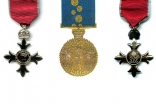 Medallions of the Most Excellent Order of the British Empire and the Medal of the Order of Australia.