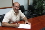 Salim Mohamed signing his TKN contract at the PCM Dubai Office on 5 March 2008. He would serve as PCM’s Regional Project Manager for East Africa.