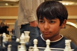 Danial Asaria plays an intense game at a national US chess championship.