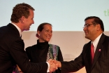 Princess Zahra and Hafiz Sherali, Chairman of the Aga Khan Planning and Building Service, Pakistan, accept the Ashden Award from His Excellency Greg Barker, UK Government Minister for Climate Change.