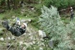 Fauzia of the FOCUS Search and Rescue Team, Gilgit demonstrates an evacuation technique.