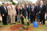 Prince Hussain plants a silver oak tree in the presence of David Boyer, Senior Director, Prince Sadruddin Fund for the Environment; Aziz Bhaloo, AKDN Resident Representative in Kenya; Dr Wing-Kun Tam, Lions Clubs International President; Murtaza Dungarwal