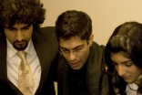 Hussein Janmohamed (centre) in a pre-show huddle with members of the Canadian Ismaili Muslim Youth Choir at a performence in Edmonton.