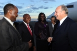 Mawlana Hazar Imam is welcomed to Arusha by the Deputy Secretaries General of the East African Community.