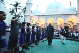 Mawlana Hazar Imam inspects Ismaili Bulbuls and Cubs standing at attention in the compound of Hasanabad in Mazagaon — the burial place of the 46th Ismaili Imam, Hazrat Aga Hasan Ali Shah, Aga Khan I.