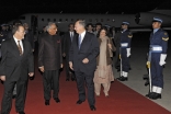 Upon his arrival in Islamabad, Mawlana Hazar Imam is received by Tariq Fatemi, Special Assistant to the Prime Minister on Foreign Affairs, and Aitmadi Iqbal Sadru-Dean Walji, President of the Ismaili Council for Pakistan.