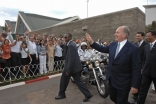 Mawlana Hazar Imam greeting members of the Jamat from Madagascar and around the world who had gathered at the airport to welcome him to Antananarivo, as President Nishad Djaffar of the Ismaili Council for Madagascar and President of the Senate, Rajemison 