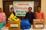 Volunteers in Kutch assisting in the collection of flood relief items