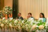 Prince Rahim and Prince Aly Muhammad applaud a performance by members of the Jamat at an Institutional Dinner in Mumbai, India.