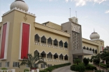 Full front view of the Maputo Jamatkhana in Mozambique. Note the glass-walled minarets. 