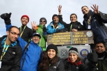 FOCUS Challenge4Life 2013 participants celebrate reaching the summit of Mount Kinabalu, before journeying on by foot, bicycle and raft to the South China Sea. Alnasir Jamal