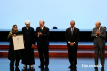 Mustafa Said, Laureate of the Performance category is conferred with an Aga Khan Music Award by Mawlana Hazar Imam, His Excellency President Marcelo Rebelo de Sousa, and Prince Amyn.