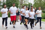 Athletes from Team United Kingdom carry the Jubilee Games Fanous to landmarks across London on their way to the Ismaili Centre. Ismaili Council for the UK / Jamil Teja