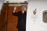 Mawlana Hazar Imam waves goodbye to the leaders assembled at Montreal airport at the end of his visit to Canada.