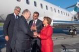 Upon his arrival in Vancouver, Mawlana Hazar Imam is greeted by Samir Manji, President of the Ismaili Council for British Columbia, and Zulie Sachedina, Chair of the International Conciliation and Arbitration Board.