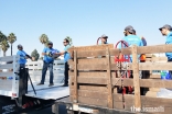 AKF and I-CERV volunteers unloading bottles, sports bottles and hot meals to be transported to the Thousand Oaks Command Center.