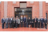 Senator David Perdue joins community members and leaders for a picture during a luncheon at the Ismaili Jamatkhana.