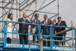 Lead design architect Farshid Moussavi, Mawlana Hazar Imam, landscape architect Thomas L. Woltz, and Ismaili Council for the United States President Al-Karim Alidina survey the future site of the Ismaili Center Houston from above.