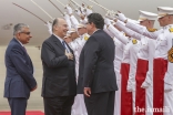 Mawlana Hazar Imam is greeted upon his arrival in Houston by Texas Secretary of State Rolando Pablos as Dr. Barkat Fazal, President of the Ismaili Council for USA, looks on.