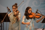 Youth expressing their devotion through music