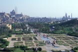 Al-Azhar park in Cairo features walkways, fountains, lawns, and gardens overlooking a lake in the traditional chahar bagh style.