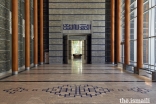 The social hall portal entrance at the Ismaili Jamatkhana and Centre, Khorog. The geometric Kufic script above the portal reads: “Al-hamdu lillahi rabil ‘alamin.”