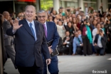 Mawlana Hazar Imam waves to the Jamat gathered outside the George R. Brown Convention Center in Houston after the last Mulaqat of his Diamond Jubilee visit to USA.