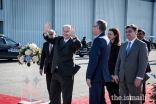 Mawlana Hazar Imam waving to the Jamati leadership.