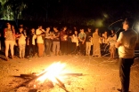 Global Encounters campers gather around a bonfire in Zanzibar. Saraan Jiwani