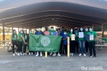 Group of volunteers prepared for park clean-up, planting, and painting.