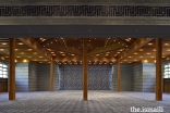 The prayer hall of the Ismaili Jamatkhana and Centre, Khorog. The geometric Kufic script at the wall articulates the names of the Ahl al-Bayt, or House of the Prophet.