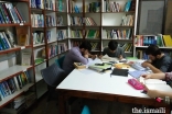 Young students study in the Gulshan-e-Noor Library and Reading Room.