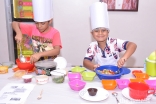 Children from the India Jamat participate in the Little Master Chef programme, which aims to help form healthy eating habits during the younger, impressionable years.