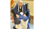 Fatima Jamani (“Maaji”) in her volunteer uniform at Ismaili Center and Jamatkhana in Atlanta.