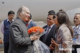 President of the Ismaili Council for Western India Aslam Lilani and his wife welcome Mawlana Hazar Imam with a bouquet of flowers upon his arrival in Mumbai.