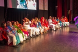  The Midwest Golden Club performs a musical number on stage.