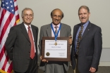 Alaudin Bhanji being presented with the Outstanding Leadership Award from NASA, by the Director of the Jet Propulsion Laboratory, Dr. Charles Elachi (L); and Dr. John M. Grunsfeld, Associate Administrator, Science Mission Directorate, NASA.