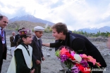 Prince Aly Muhammad is presented a bouquet of flowers upon his arrival in Immit, Ishkoman Punyal, Gilgit-Baltitsan in October 2017.