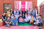 Family members and friends gather for a group photo at the Central Asian Jamat celebration