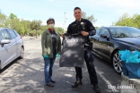 A Milpitas Police officer receives an I-CERV t-shirt from an Ismaili volunteer.