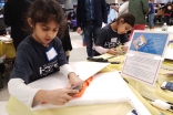 Young I-CERV Boston volunteers  commemorate MLK day through supporting  local immigrant and refugee families through the creation of ESOL (English for Speakers of Other Languages) learning tools 